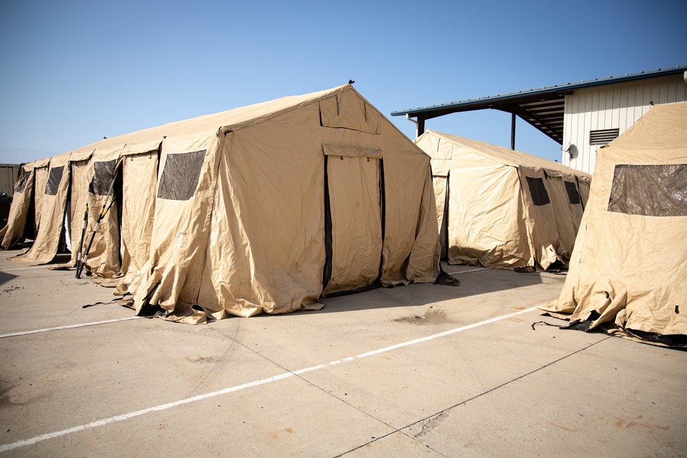 CBMU 303 assists MESG-1 during NIEX Tent set up