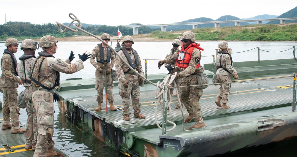 U.S. Soldiers Execute Wet Gap Bridging Exercise