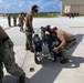 Helicopter Sea Combat Squadron (HSC) 25 prepared to onload a Captive Air Training Missile (CATM) for a firing exercise.