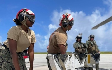 Helicopter Sea Combat Squadron (HSC) 25 prepared to onload a Captive Air Training Missile (CATM) for a firing exercise.