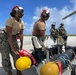 Helicopter Sea Combat Squadron (HSC) 25 prepared to onload a Captive Air Training Missile (CATM) for a firing exercise.