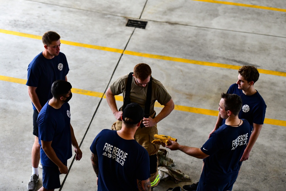 CGOs suit up, learn fire safety with Fire Dawgs