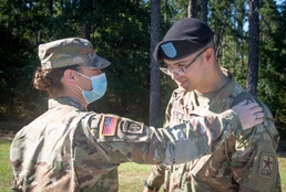 Mom, son duo both graduate at Fort Jackson