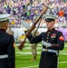 Marines with Silent Drill Platoon perform for the Minnesota Vikings halftime show.