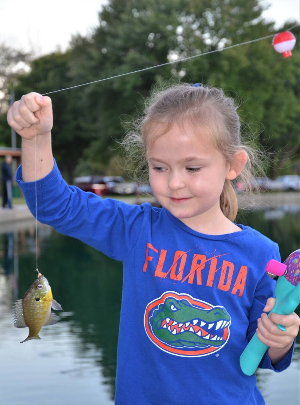 ACS Fatherhood program hooks dads, kids for fishing fun