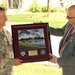 Col. Bailey presents gift