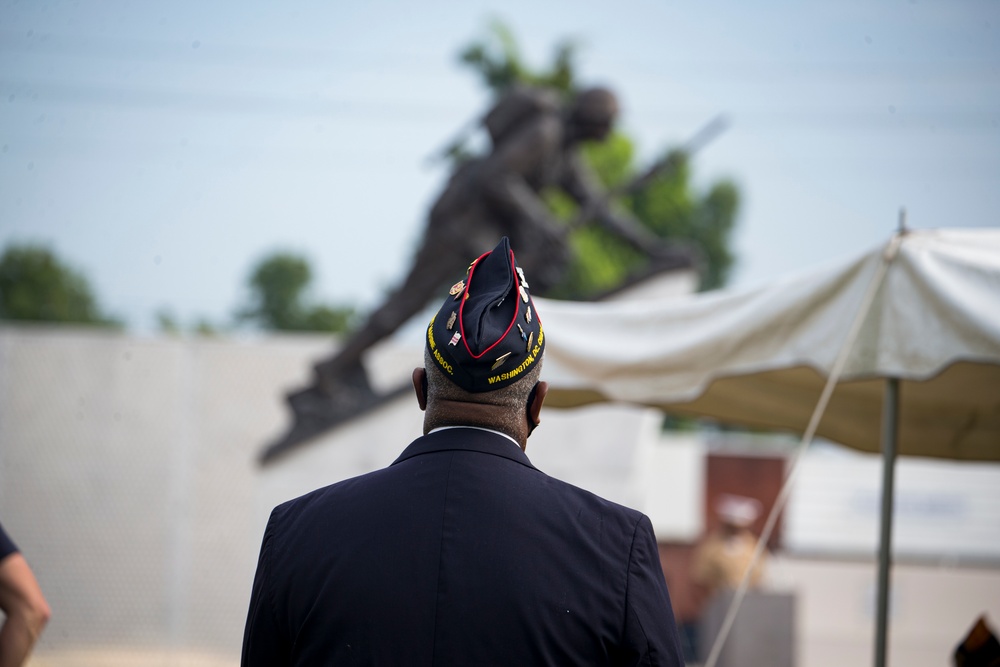 Marines with Silent Drill Platoon march during a performance at the 12th Montford Point Marine Day Ceremony