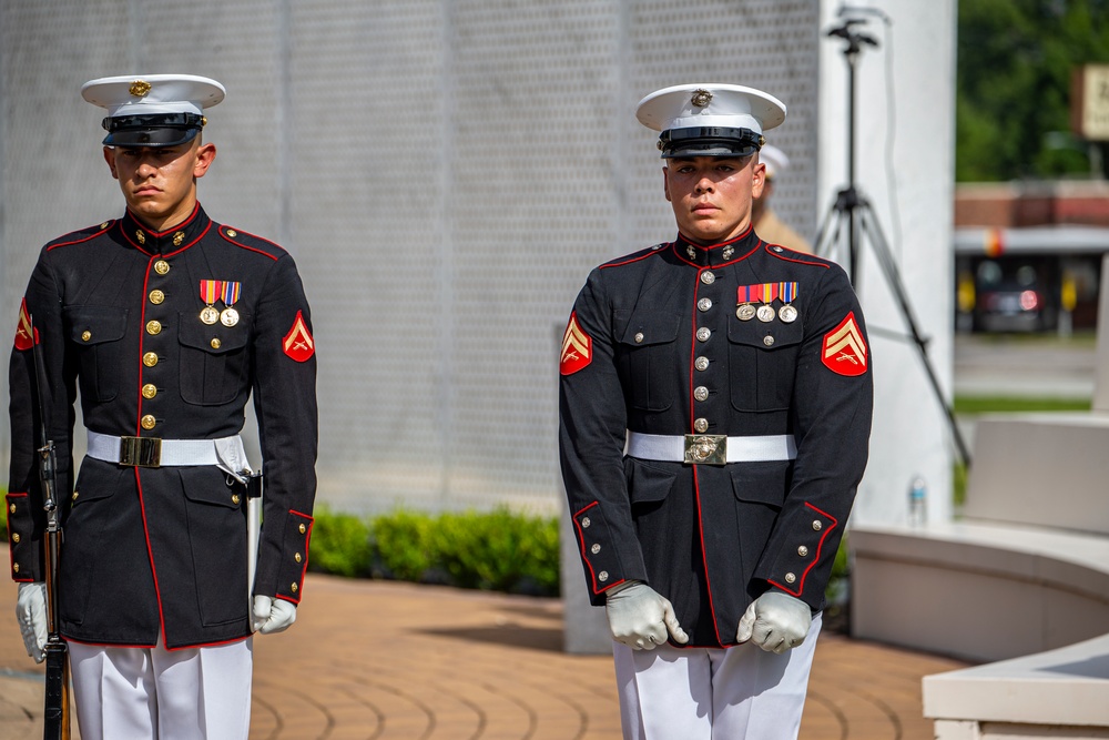 Marines with Silent Drill Platoon march during a performance at the 12th Montford Point Marine Day Ceremony