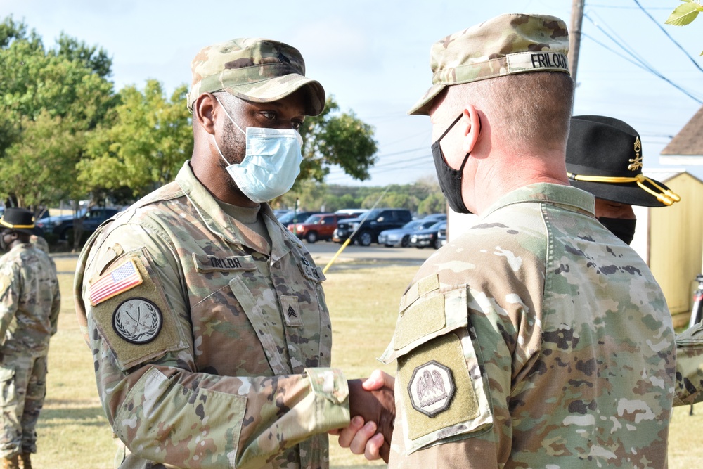 Louisiana National Guard joint staff director presents Louisiana National Guard Emergency Service Medal to 3d Cavalry Regiment troopers