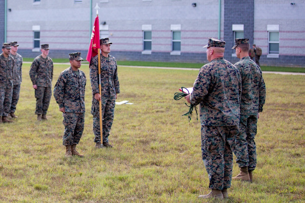 Marines with 3rd Battalion, 6th Marine Regiment receive a French Fourragere