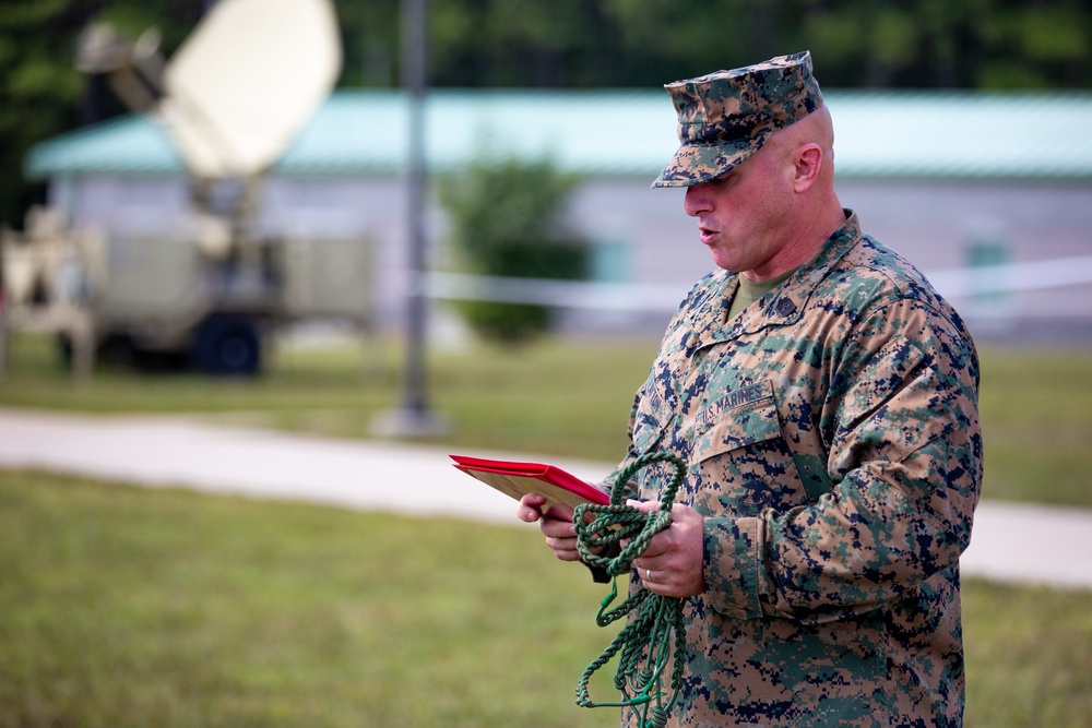 Marines with 3rd Battalion, 6th Marine Regiment receive a French Fourragere