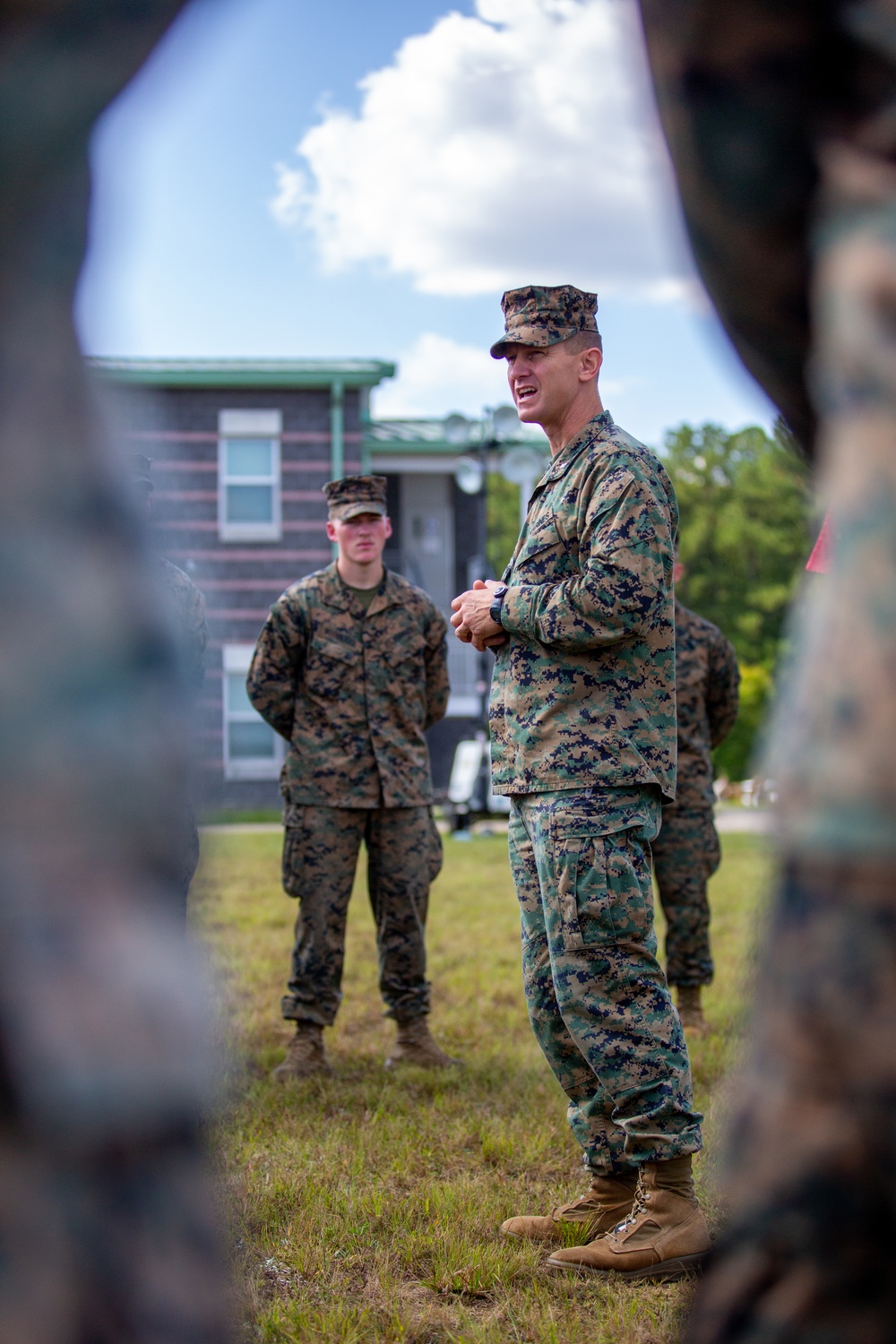 Marines with 3rd Battalion, 6th Marine Regiment receive a French Fourragere