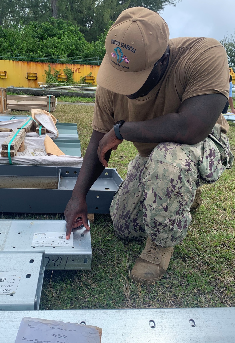 US Navy Seabees assigned to NMCB-5 prepare to build a gas cylinder storage unit