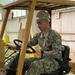 US Navy Seabees assigned to NMCB-5 prepare to build a gas cylinder storage unit