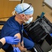 Member of the U.S. Army Medical Response Team Does Routine Hospital Work