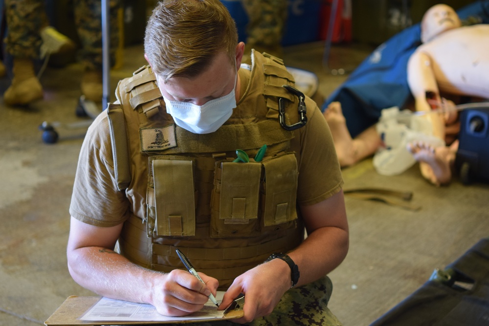 US Navy Corpsman assigned to Naval Mobile Construction Battalion 5 train at Project Valkyrie