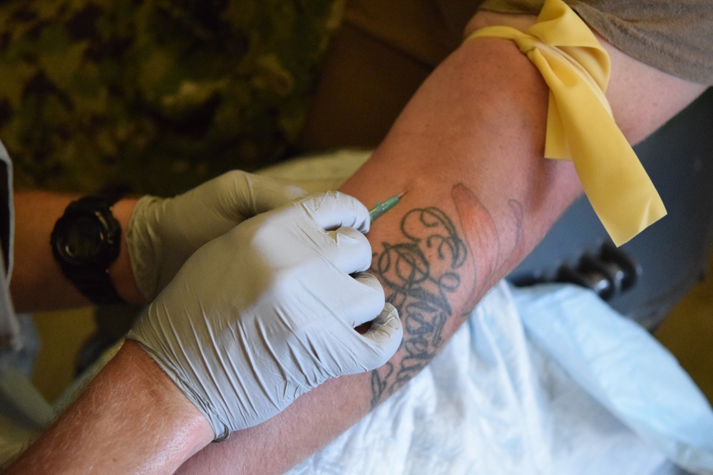 US Navy Corpsman assigned to Naval Mobile Construction Battalion 5 train at Project Valkyrie