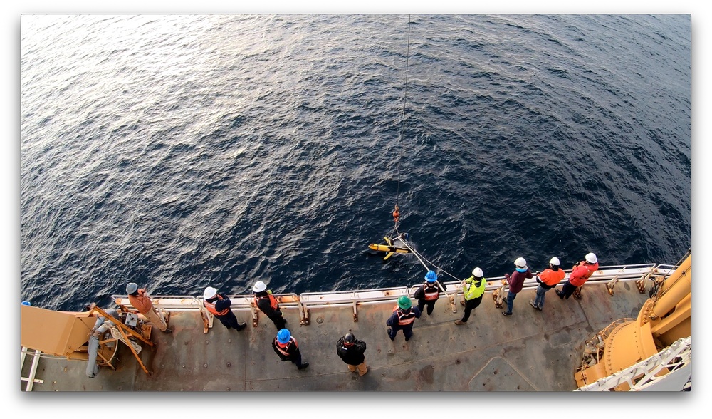 Coast Guard Cutter Healy crewmembers and scientists launch autonomous glider into Disko Bay