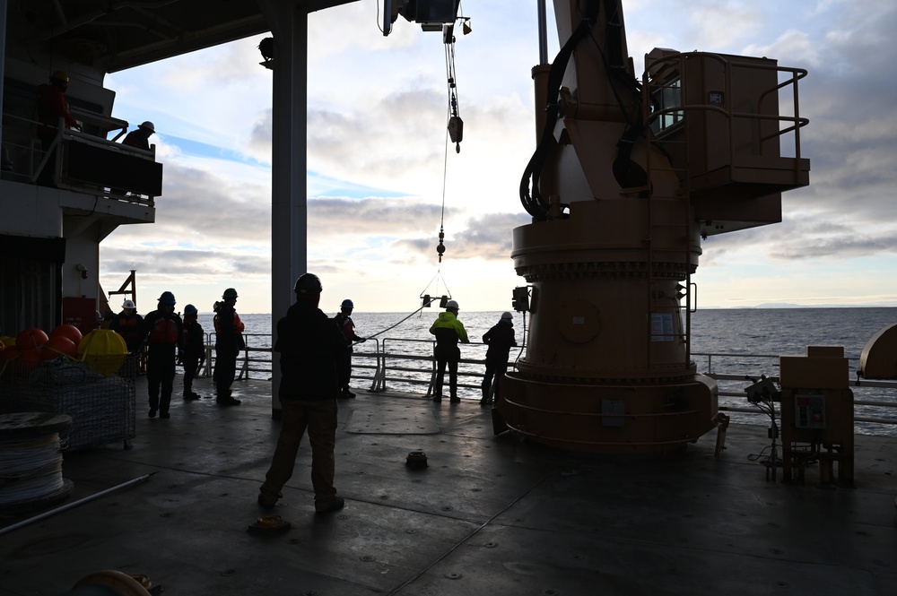 Coast Guard Cutter Healy crewmembers and scientists launch autonomous glider into Disko Bay