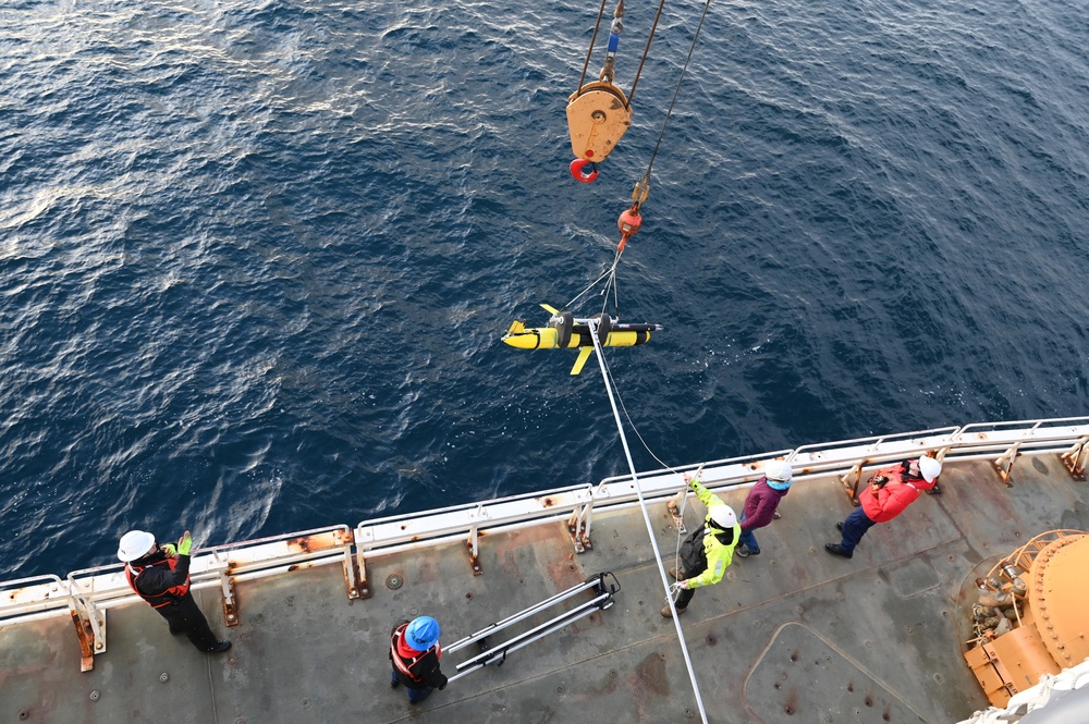 Coast Guard Cutter Healy crewmembers and scientists launch autonomous glider into Disko Bay