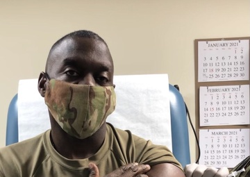 LTGDINGLE.jpg - Lt. Gen. R. Scott Dingle, Surgeon General of the Army, receives his first dose of a COVID-19 vaccine