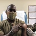 LTGDINGLE.jpg - Lt. Gen. R. Scott Dingle, Surgeon General of the Army, receives his first dose of a COVID-19 vaccine