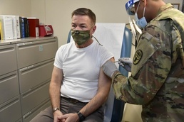 Gen. James C. McConville, Chief of Staff of the Army, receives his first dose of the COVID-19 vaccine