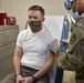 Gen. James C. McConville, Chief of Staff of the Army, receives his first dose of the COVID-19 vaccine