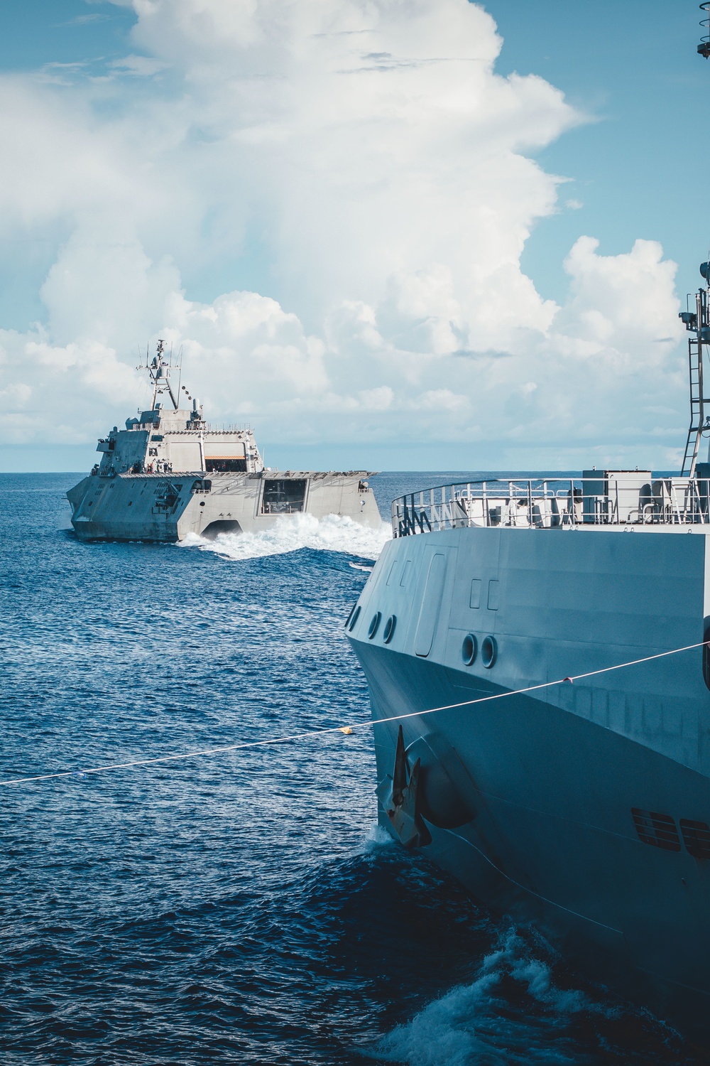 USS Charleston (LCS 18) sails with Royal New Zealand Navy ships HMNZS AOTEAROA (A11) and HMNZS TE KAHA (F77)