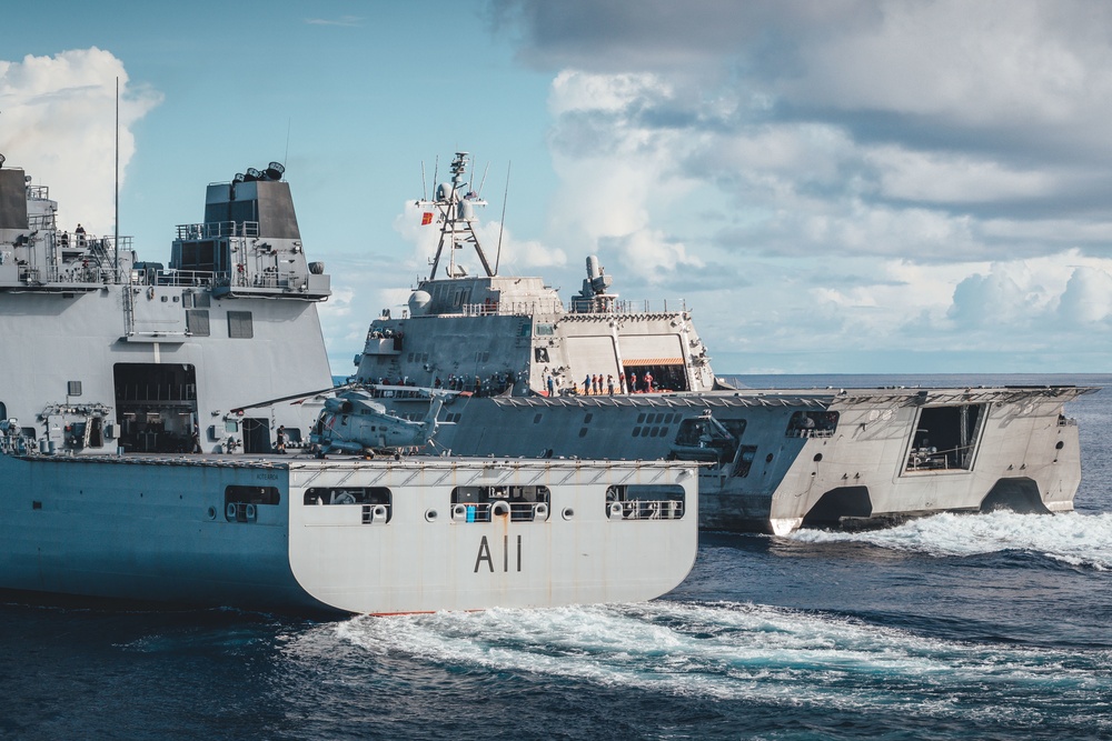 USS Charleston (LCS 18) sails with Royal New Zealand Navy ships HMNZS AOTEAROA (A11) and HMNZS TE KAHA (F77)