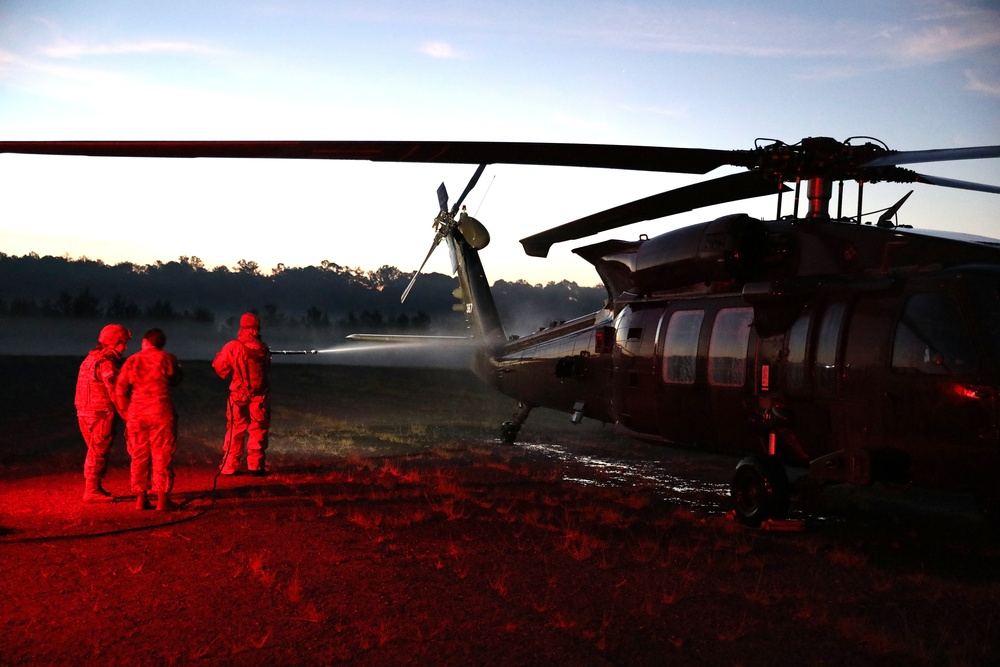 U.S. Army Soldiers assigned to the 83rd Chemical, Biological, Radiological and Nuclear Battalion Perform Aircraft Decontamination