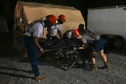 113th FSRP lower a gurney during CERFP pre-evaluation and training