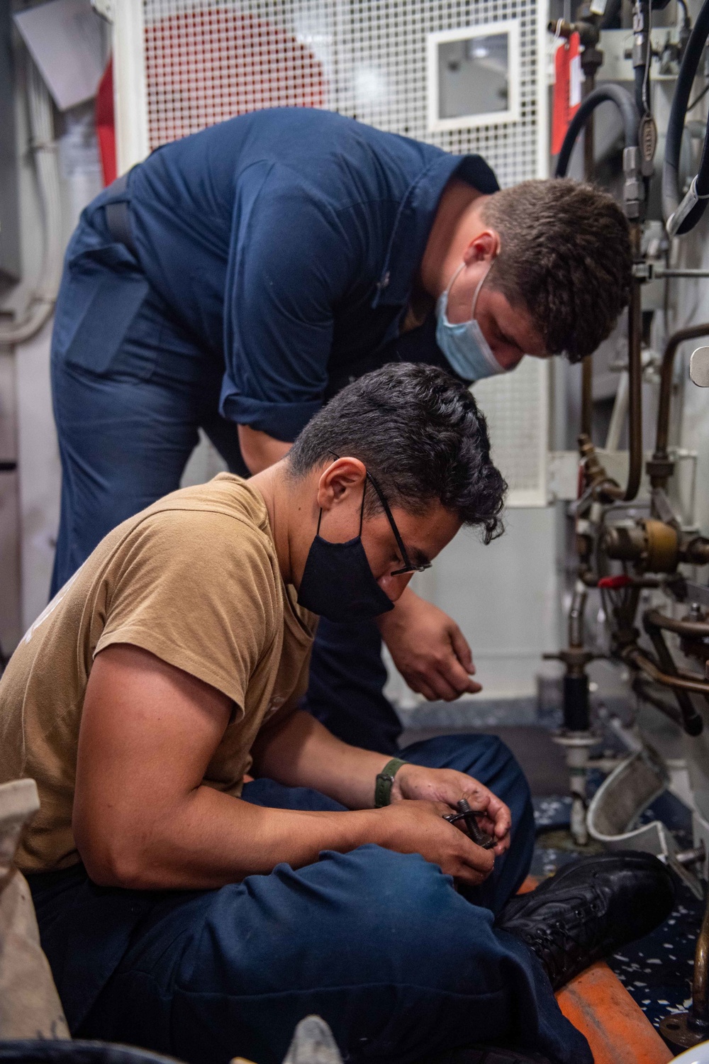 Gunner’s Mate Conducts Maintenance of the Magazine Sprinkler Aboard USS Michael Murphy (DDG 112)