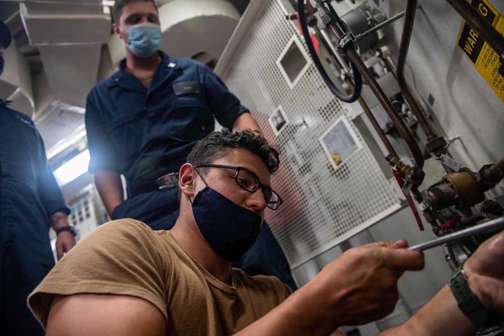 Fire Controlman Conducts Maintenance of the Magazine Sprinkler Aboard USS Michael Murphy (DDG 112)