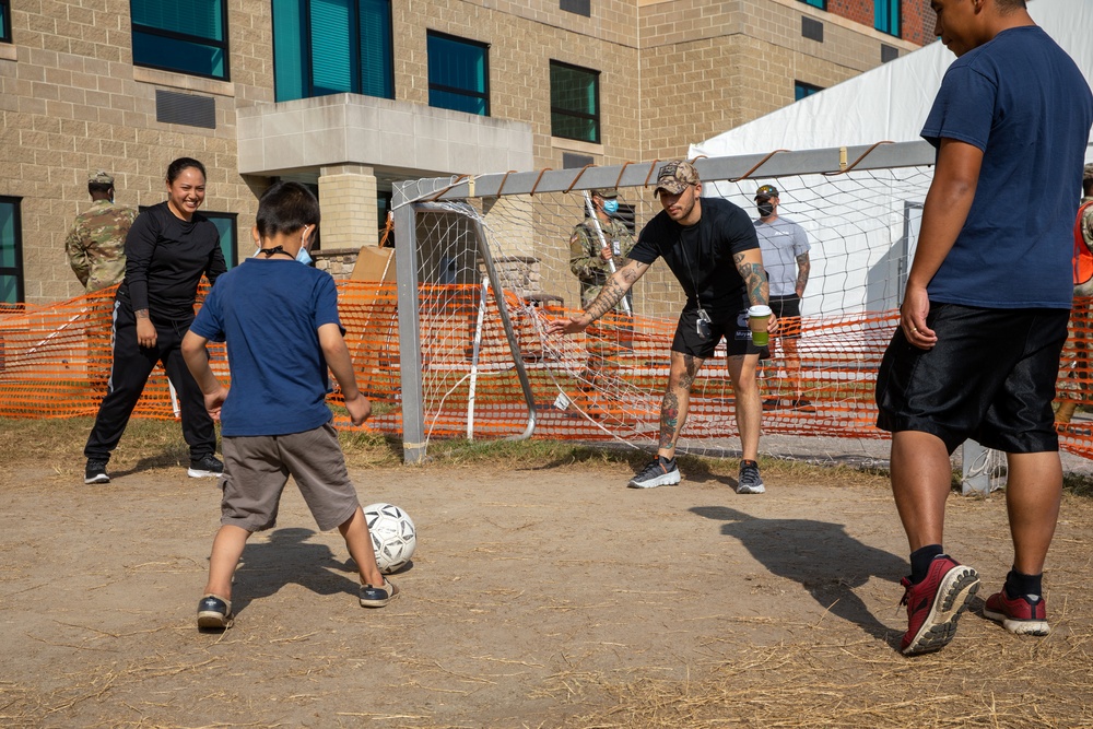 Soldiers Play Soccer with Afghan Guests