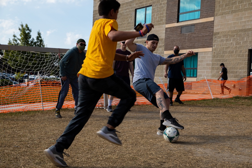 Soldiers Play Soccer with Afghan Guests