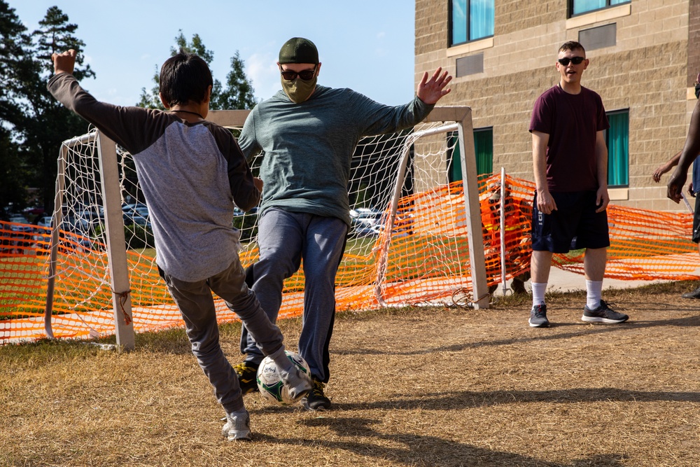 Soldiers Play Soccer with Afghan Guests