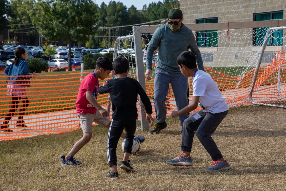 Soldiers Play Soccer with Afghan Guests