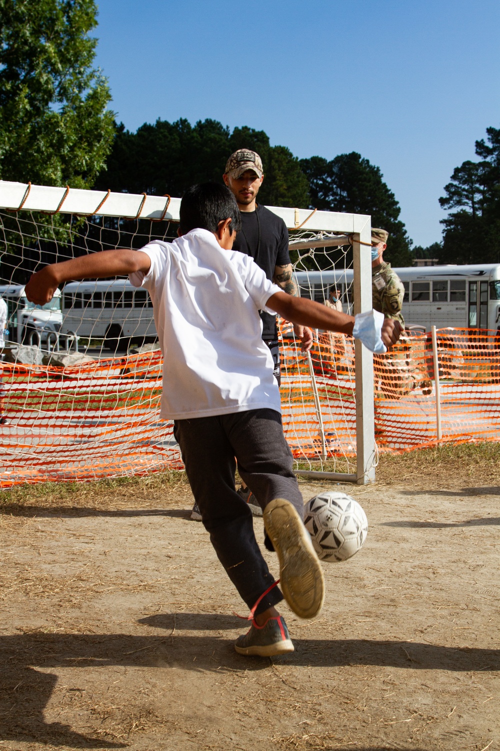 Soldiers Play Soccer With Afghan Personnel