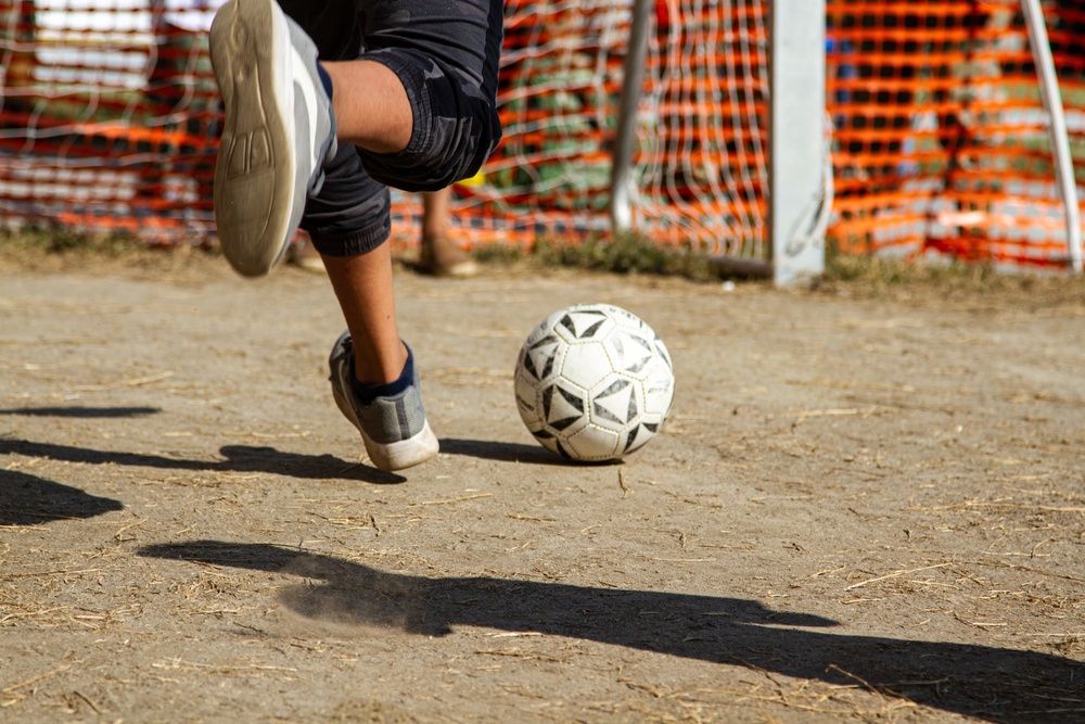 Soldiers Play Soccer With Afghan Personnel