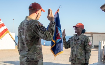 TF Sinai Postal NCOIC is Promoted following Reenlistment