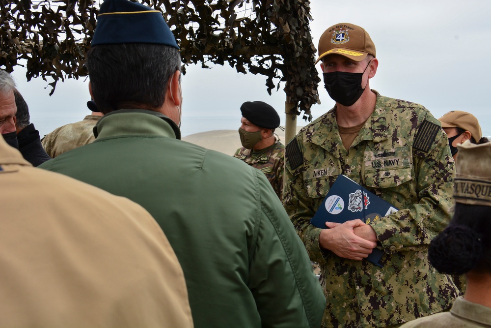 Rear Adm. Jim Aiken talks with Peruvian General Ruben Gambarini