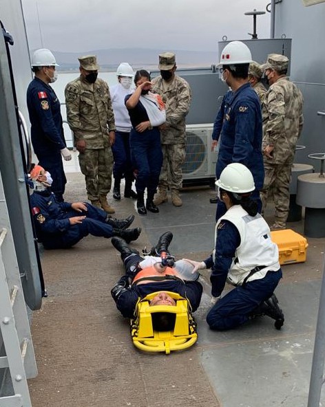 Peruvian sailors aboard the Makassar-class landing platform dock ship BAP Pisco (AMP 156) conduct medical training as part of a mass casualty drill