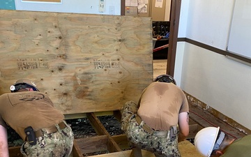 7th Engineer Support Battalion Marines Work with Navy Seabees by in renovation of floor