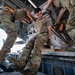 U.S. Airmen Load Cargo