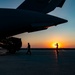 U.S. Air Force Loadmaster Guides U.S. Army M142 High Mobility Artillery Rocket System Into Aircraft