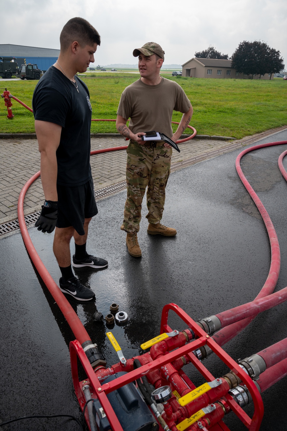 Firefighters check a kilometer of firehoses