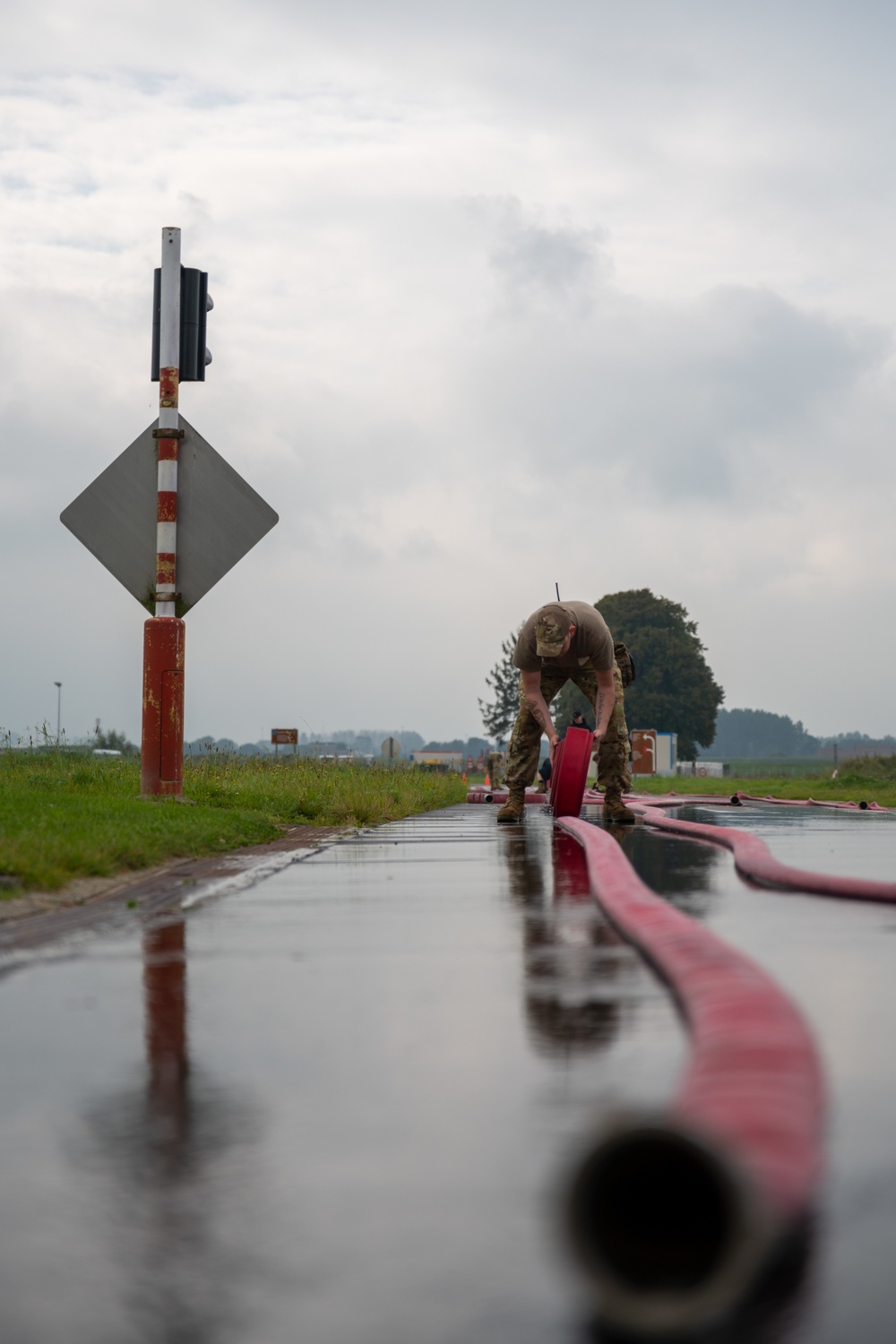 Firefighters check a kilometer of firehoses