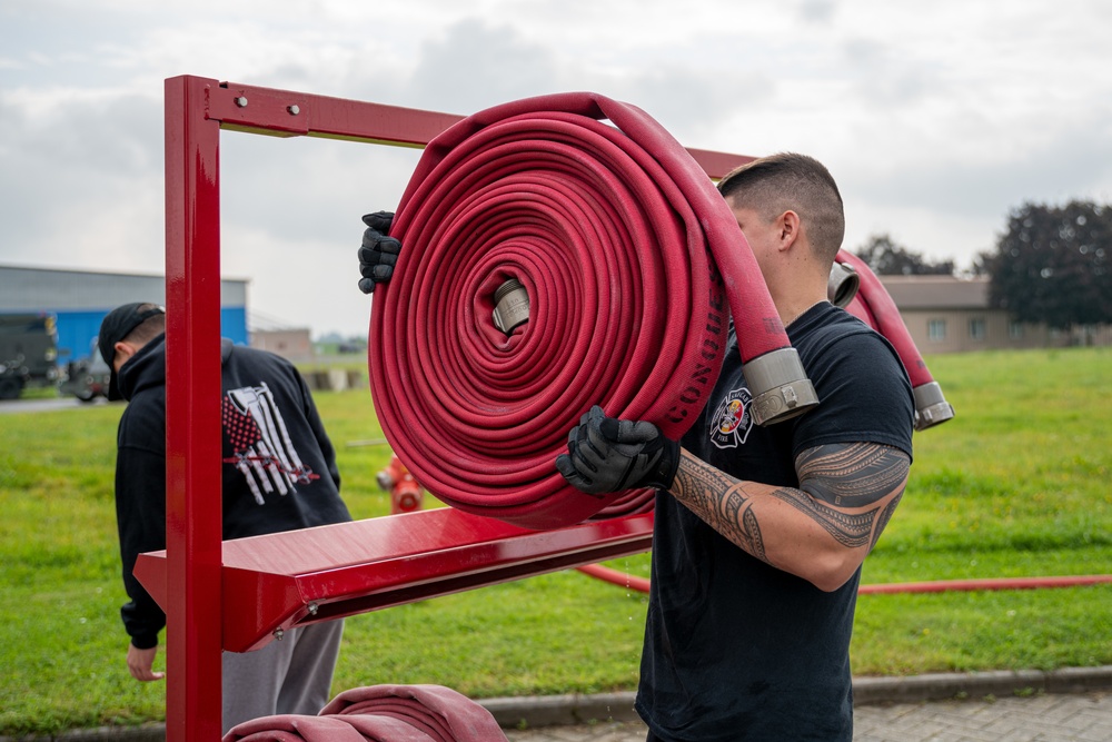 Firefighters check a kilometer of firehoses