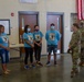 Personnel stationed at Camp Atterbury welcome the family of fallen service member